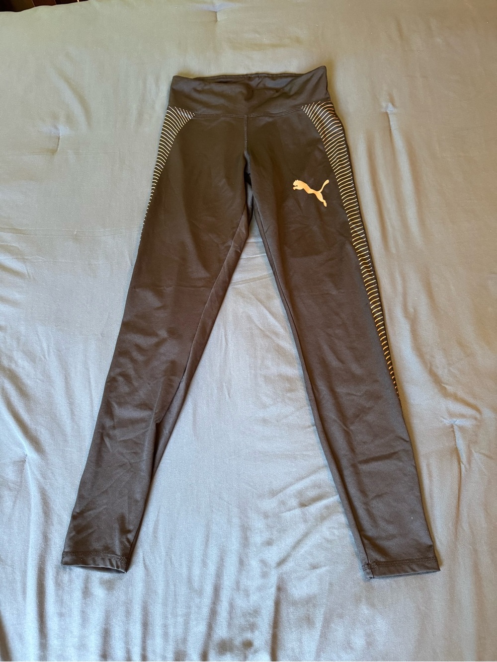 Puma Black Leggings with Gold Logo and Stripe Accents